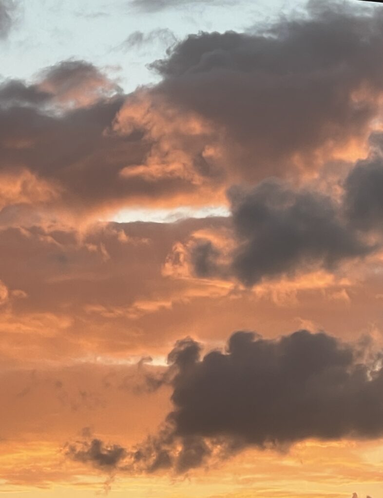 Golden clouds during sunset at Mellowmood villa