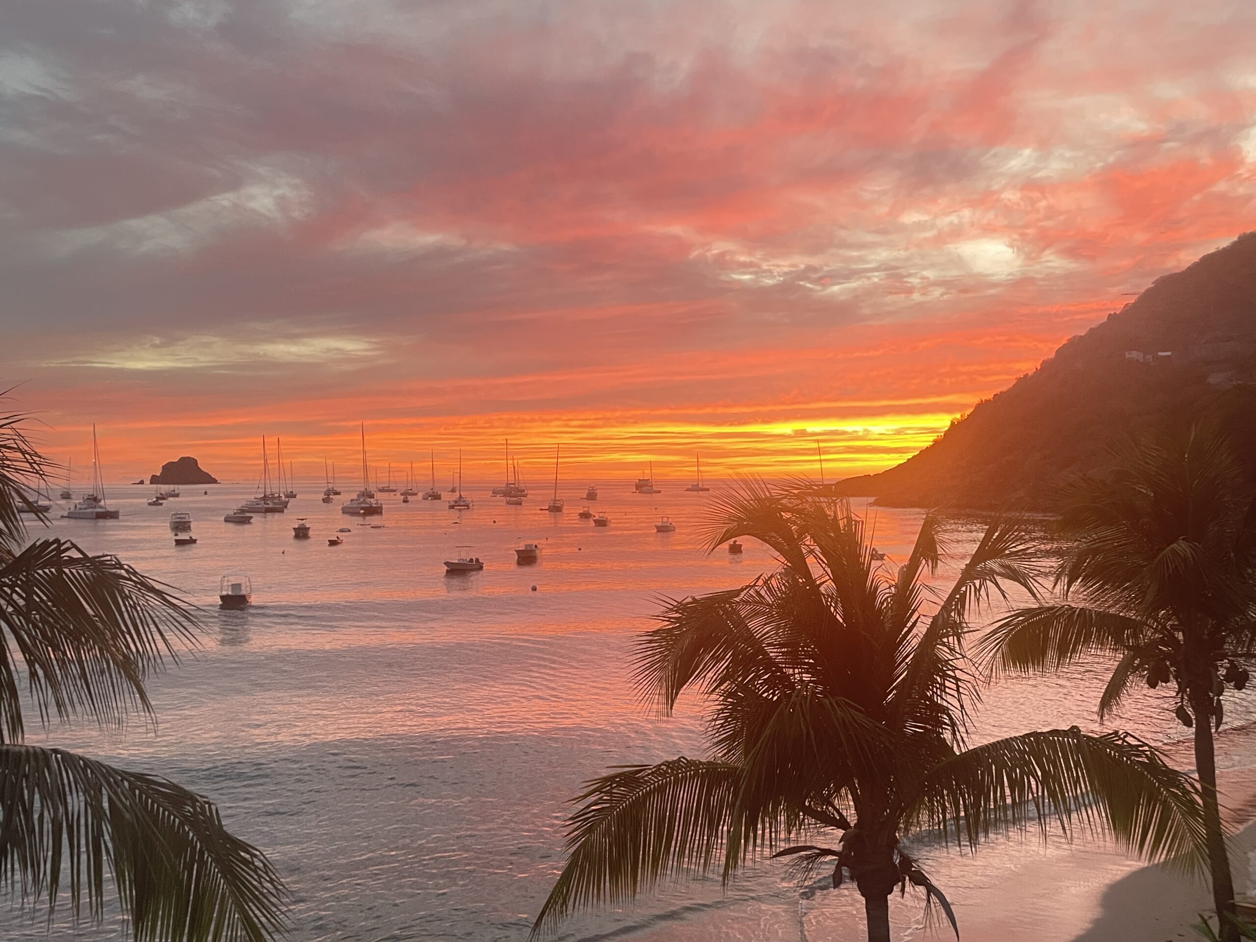 Vibrant sunset over the ocean at St Barth